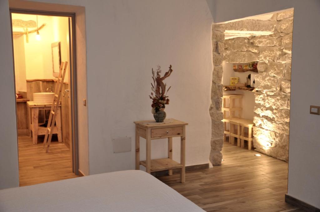 Łóżko lub łóżka w pokoju w obiekcie B&B François le cordonnier maison de charme