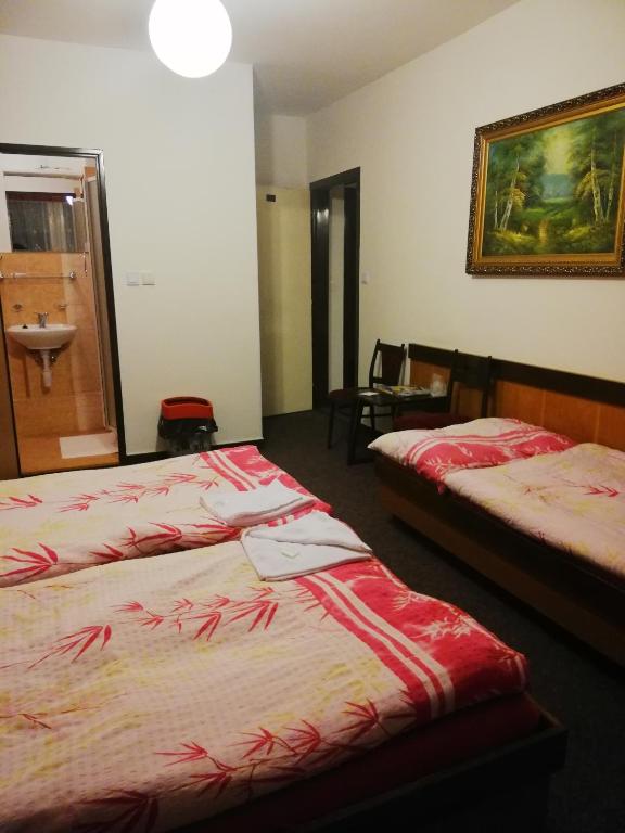 Postel nebo postele na pokoji v ubytování ABC Hotel Nitra