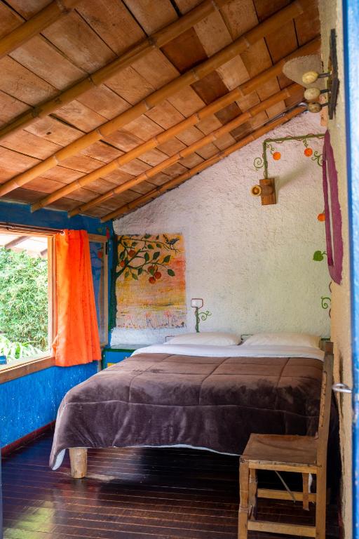 Postel nebo postele na pokoji v ubytování Hotel Casa de Nelly