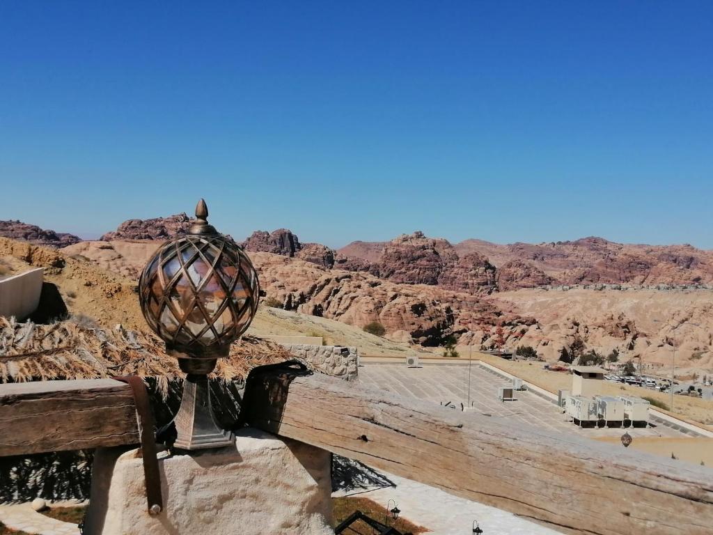 a view of the desert from the top of a mountain at Infinity Lodge in Wadi Musa