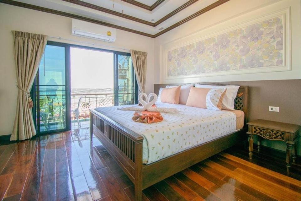 Letto o letti in una camera di TC villa on beach