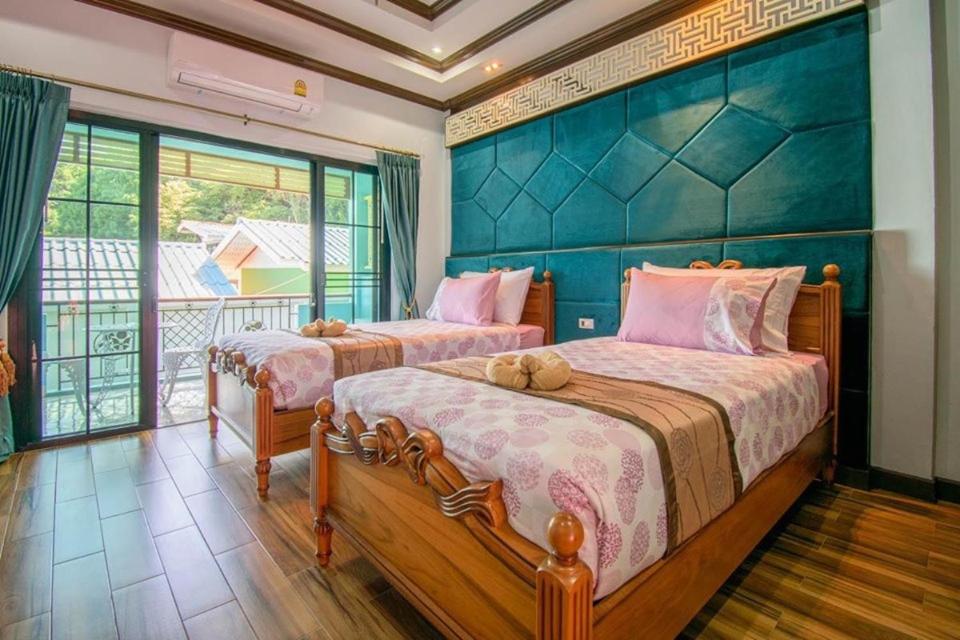 Letto o letti in una camera di TC villa on beach