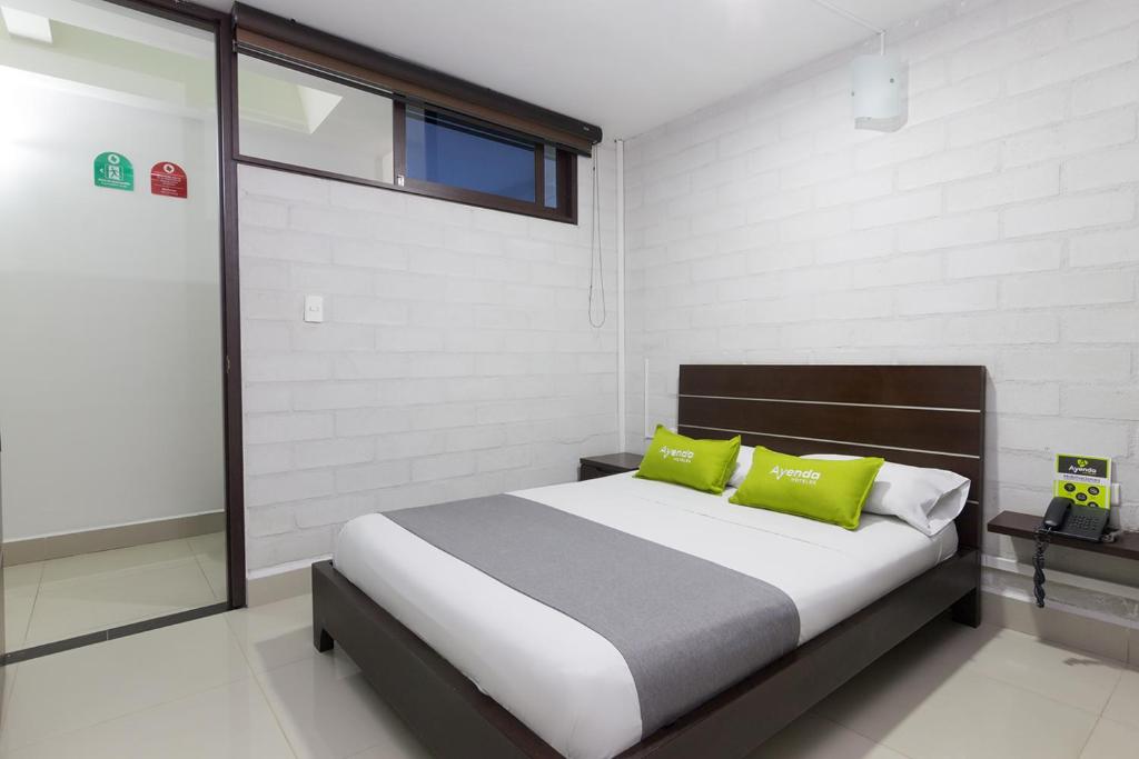 Cama o camas de una habitación en Ayenda 1254 Mi Colombia