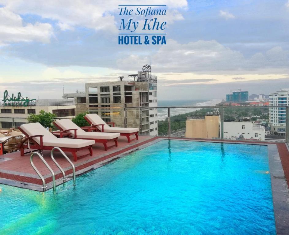 a swimming pool on the roof of a building at Sofiana My Khe Hotel & Spa- Rooftop Pool Bar in Danang