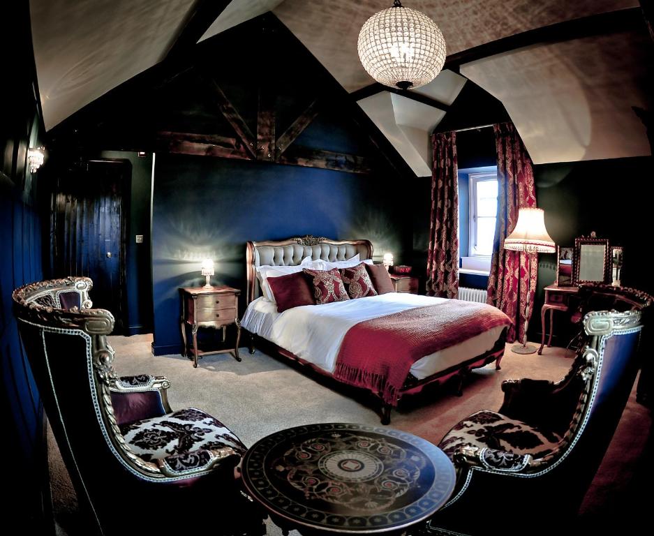 En eller flere senge i et værelse på The Joiners Arms
