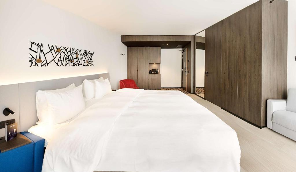 Postel nebo postele na pokoji v ubytování Radisson Blu Hotel, Bruges
