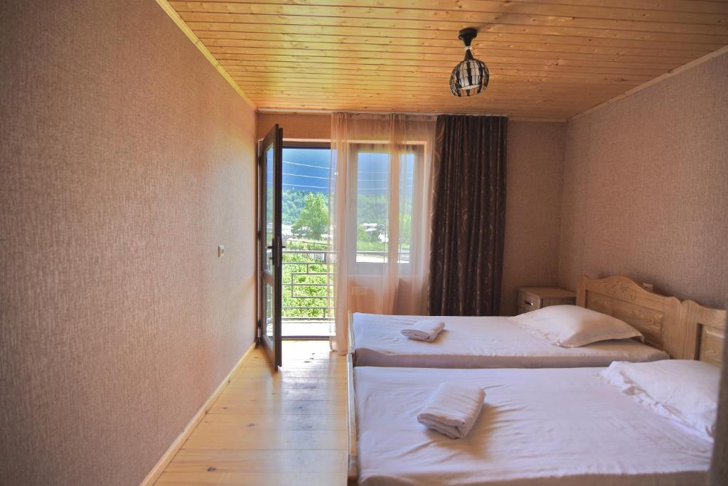 Postel nebo postele na pokoji v ubytování Saba