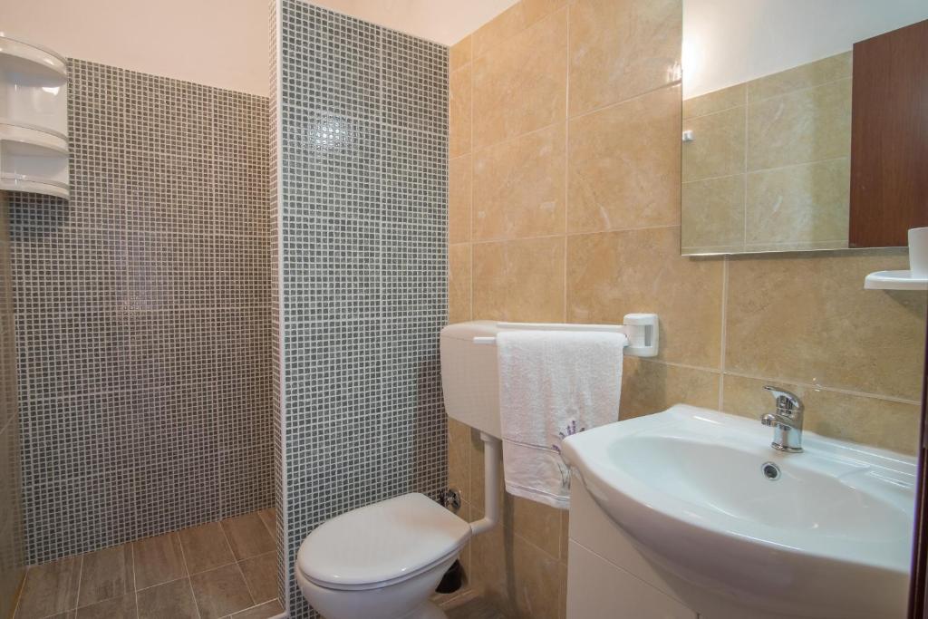 Łazienka w obiekcie Villa Dijana East