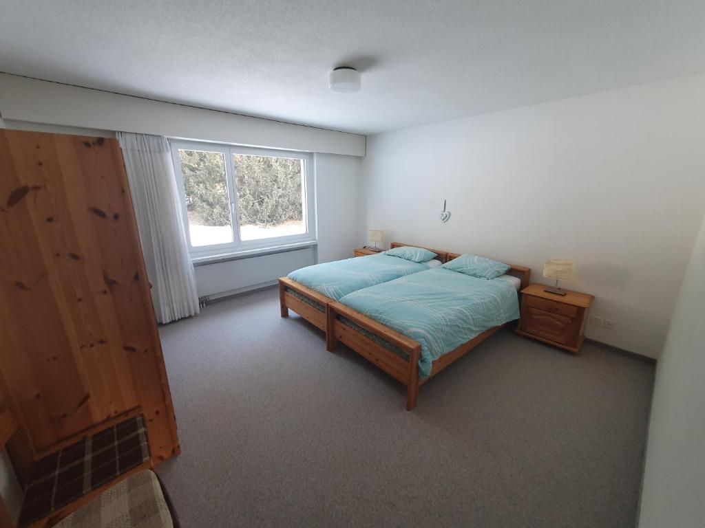 Postel nebo postele na pokoji v ubytování Apartment in Lenzerheide