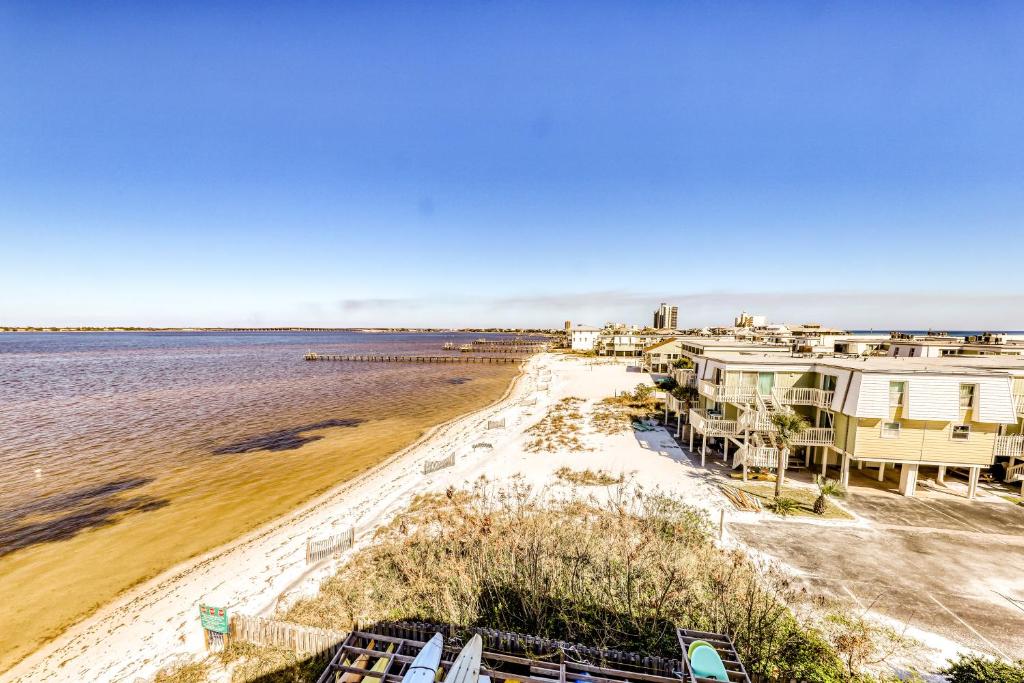a view of a beach with houses and the water at Bayview Beach Escape in Pensacola Beach