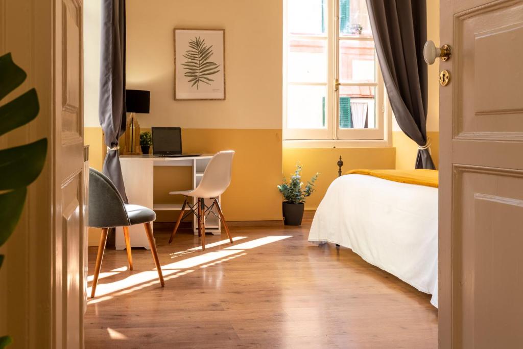 Posteľ alebo postele v izbe v ubytovaní Family Apartments Angeli