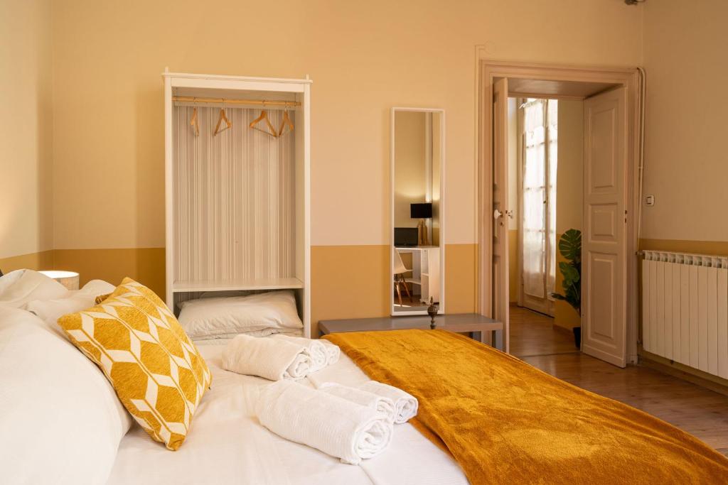 Posteľ alebo postele v izbe v ubytovaní Family Apartments Angeli