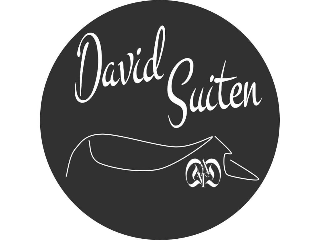 a black and white label with a pair of wedding rings at DAVID SUITEN in Mauterndorf