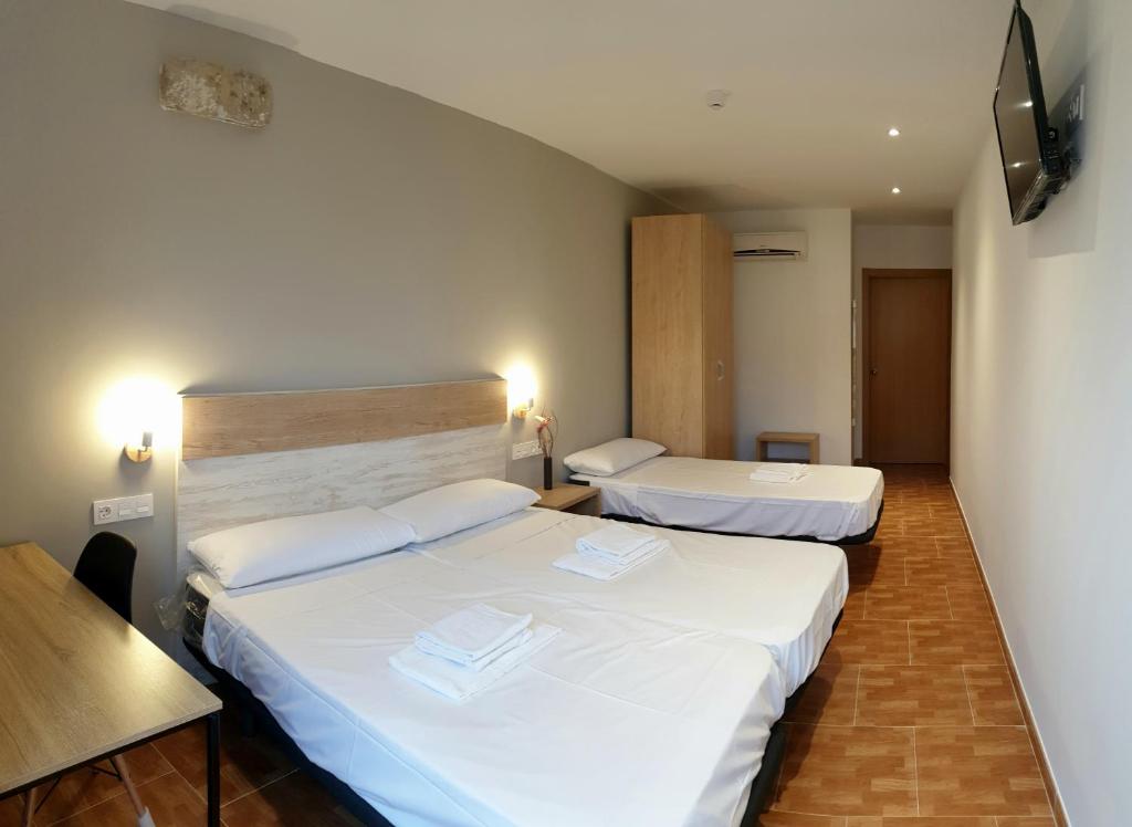 Postel nebo postele na pokoji v ubytování B&B La Atalaya