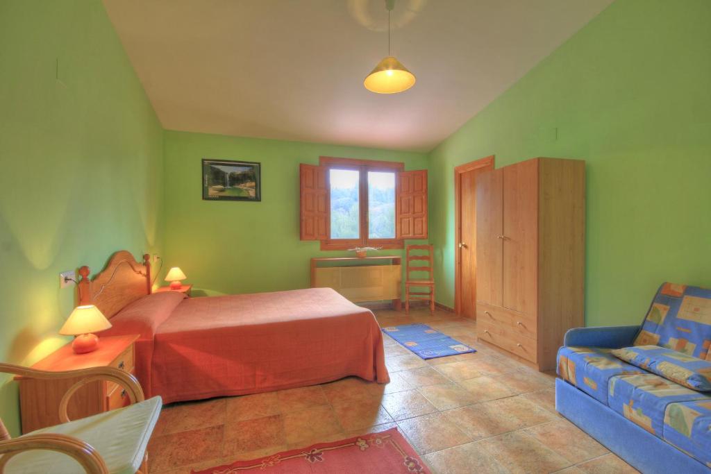 Postel nebo postele na pokoji v ubytování Albergue Barranc de la Serra