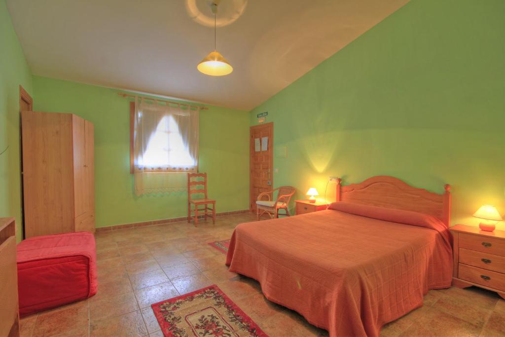 Postel nebo postele na pokoji v ubytování Albergue Barranc de la Serra