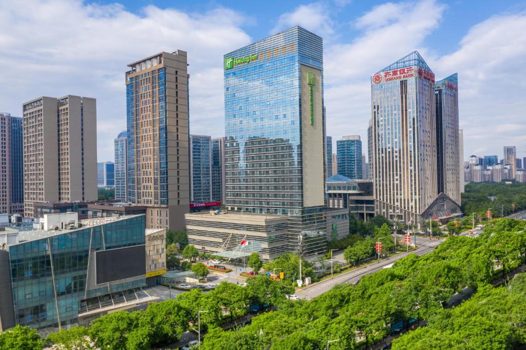 a city skyline with tall skyscrapers at Holiday Inn Xi'an Greenland Century City, an IHG Hotel in Xi'an