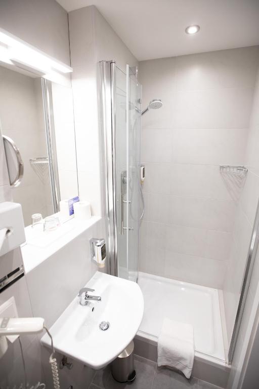 Koupelna v ubytování Hotel Elite