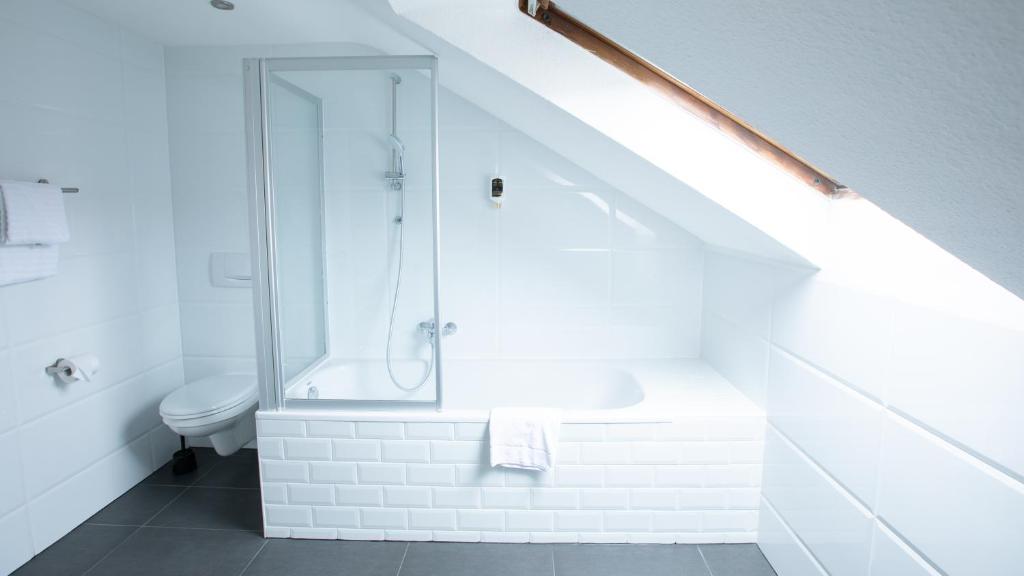 Koupelna v ubytování Hotel Elite