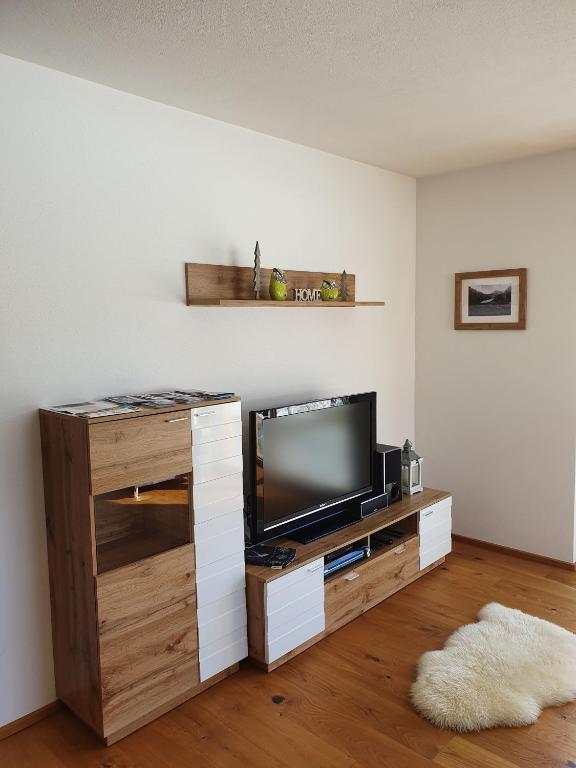 Televízia a/alebo spoločenská miestnosť v ubytovaní Ferienwohnung App. MOUNTAIN VIEW