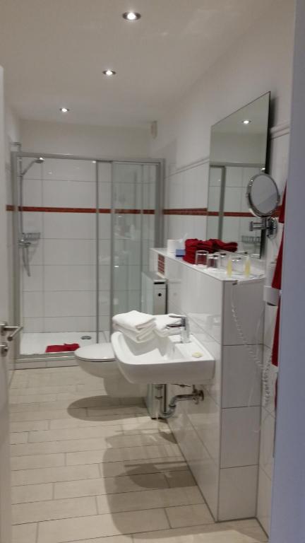 Koupelna v ubytování Hotel Garni Dorfkammer