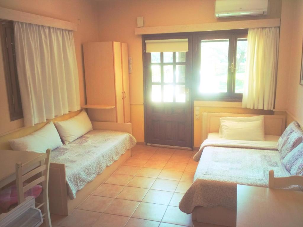 Posteľ alebo postele v izbe v ubytovaní Rent Rooms Alexiou