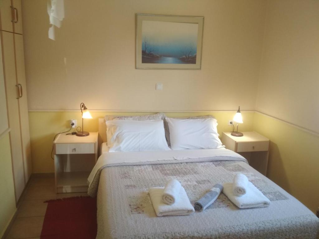 Posteľ alebo postele v izbe v ubytovaní Rent Rooms Alexiou