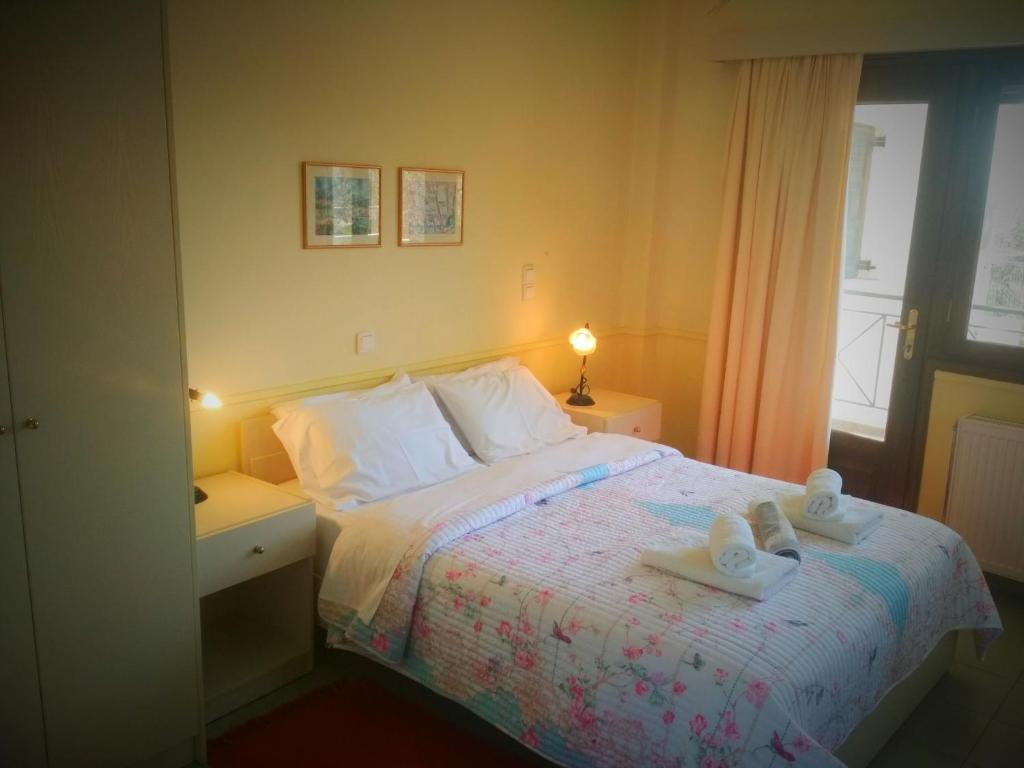 Posteľ alebo postele v izbe v ubytovaní Rent Rooms Alexiou