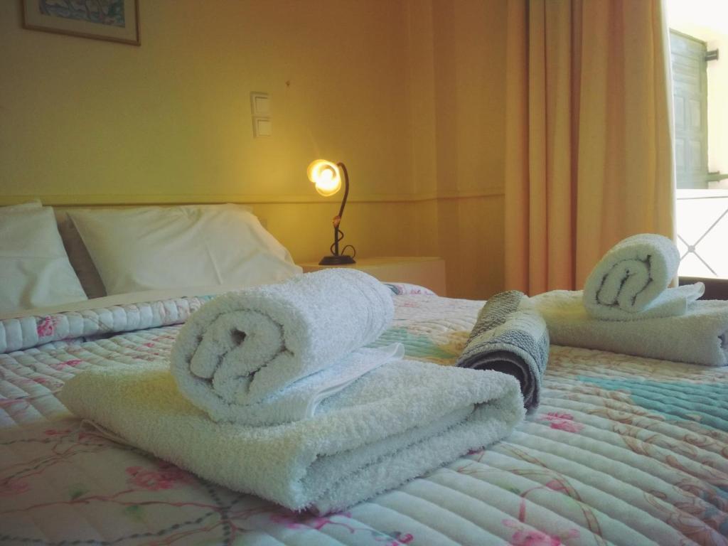 Posteľ alebo postele v izbe v ubytovaní Rent Rooms Alexiou