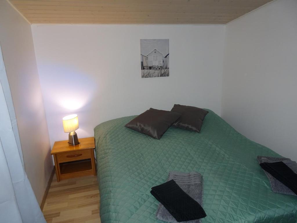 Postel nebo postele na pokoji v ubytování Fab Studio