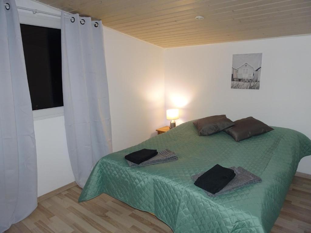 Postel nebo postele na pokoji v ubytování Fab Studio