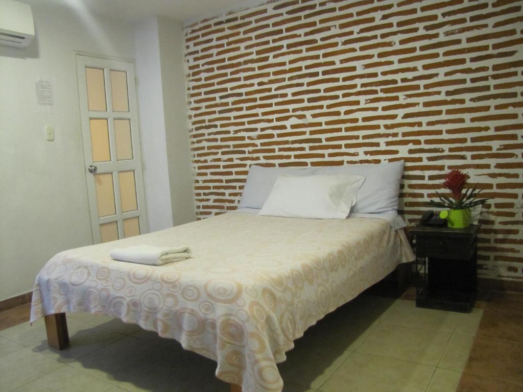 Postel nebo postele na pokoji v ubytování Hotel Mar del Plata