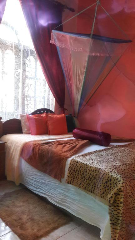 Postel nebo postele na pokoji v ubytování Daffon Guest House