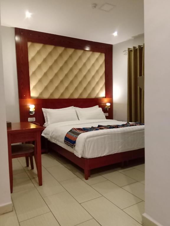 Voodi või voodid majutusasutuse seven7days hotel toas