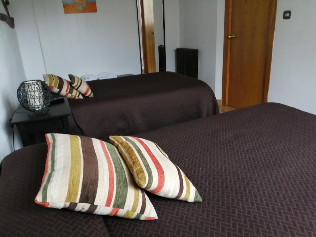Postel nebo postele na pokoji v ubytování La Casita Camponaraya