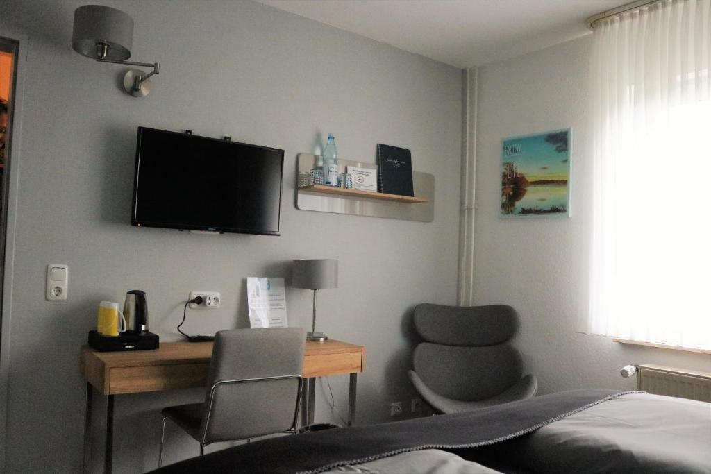 TV a/nebo společenská místnost v ubytování Hotel Schmerkötter
