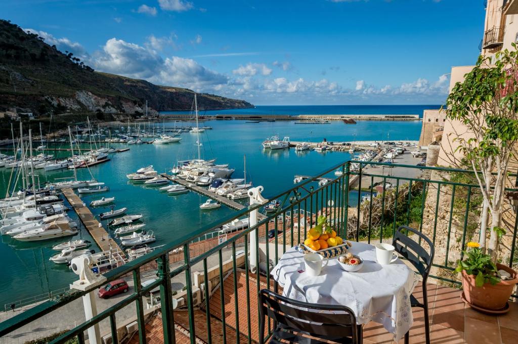 a view of a marina with boats in the water at Veranda sul Porticciolo in Castellammare del Golfo