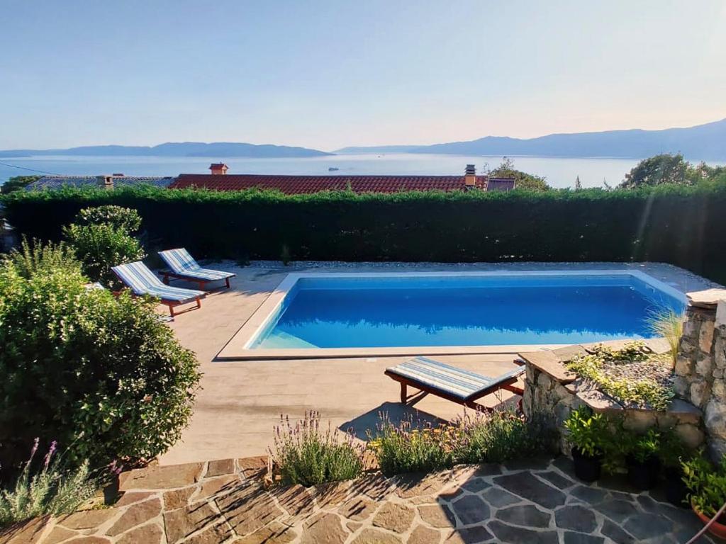 Bazén v ubytovaní *****Pool house with beautiful seaview,big garden and old tavern***** alebo v jeho blízkosti