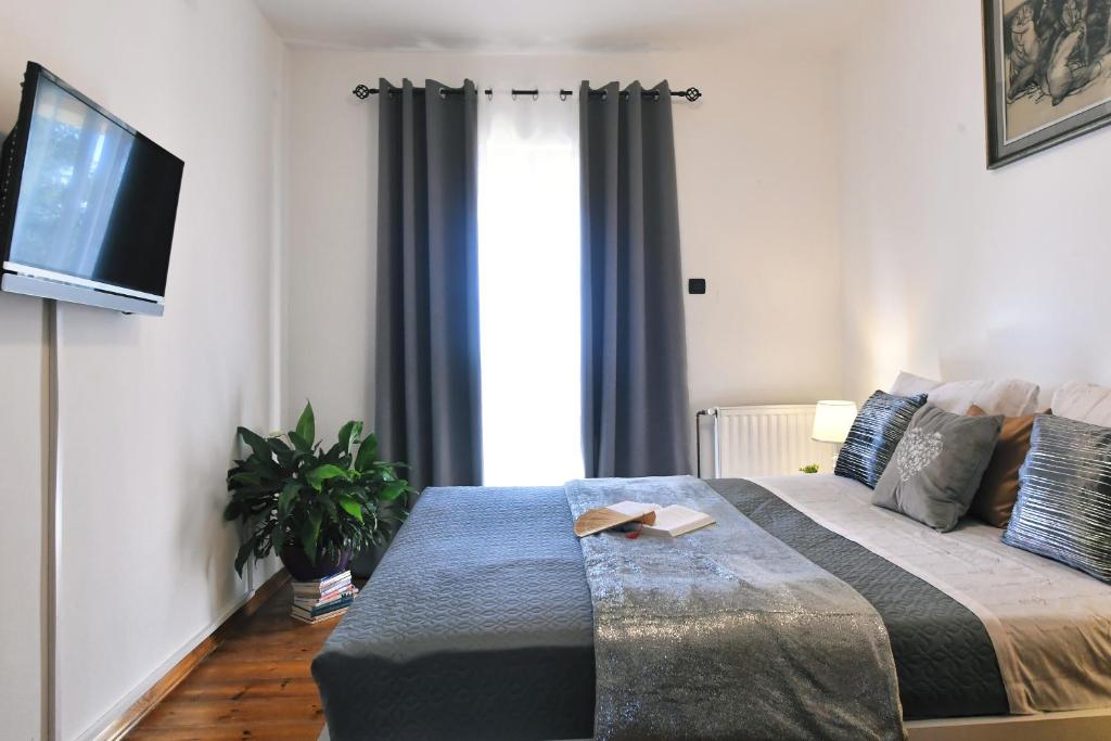 Posteľ alebo postele v izbe v ubytovaní *****Pool house with beautiful seaview,big garden and old tavern*****