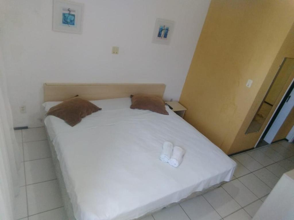 Postel nebo postele na pokoji v ubytování Silva Hospedagem FLAT BELLAGIO BEIRA MAR