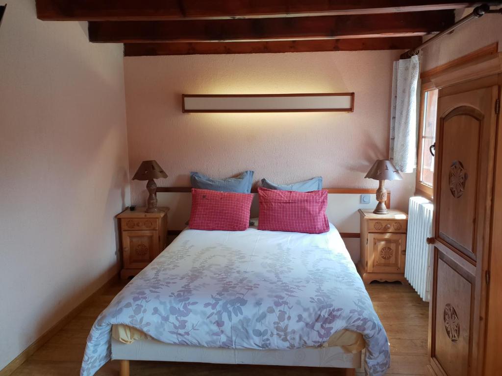 Ένα ή περισσότερα κρεβάτια σε δωμάτιο στο GRAND CHALET DU BOREON