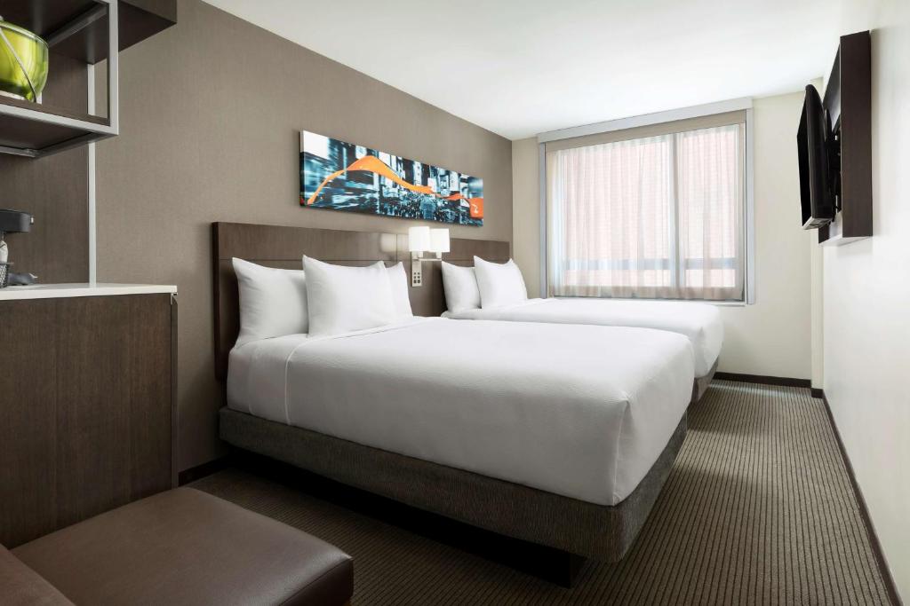 Postel nebo postele na pokoji v ubytování Hyatt Place New York City - Times Square