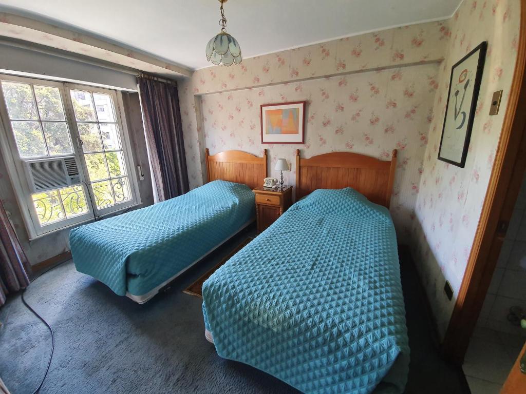 Postel nebo postele na pokoji v ubytování Hotel Foresta
