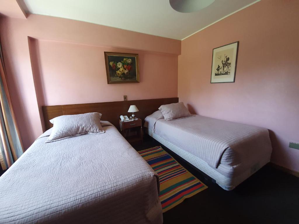 Postel nebo postele na pokoji v ubytování Hotel Foresta