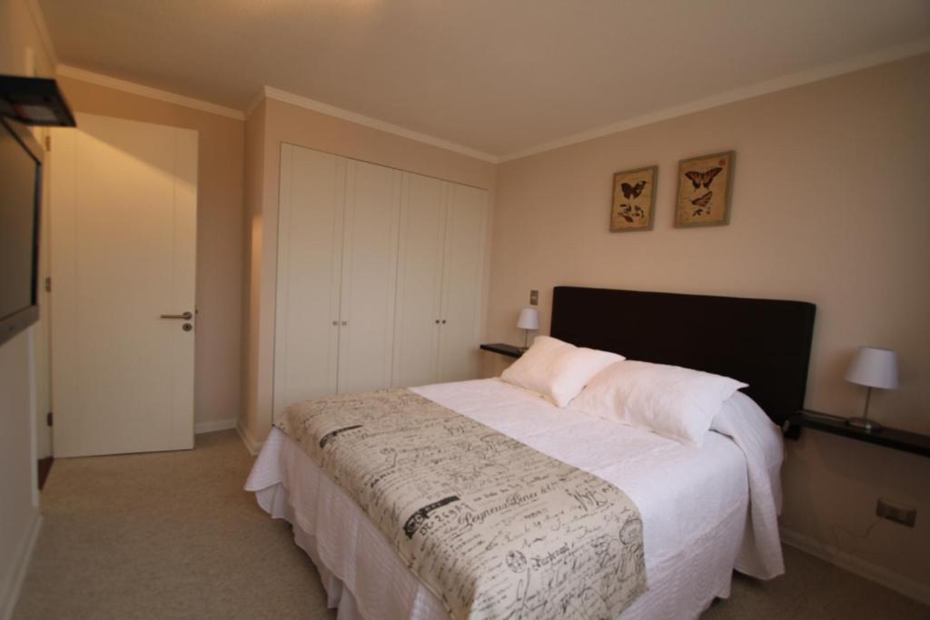 Voodi või voodid majutusasutuse Alto Sporting Apartments toas