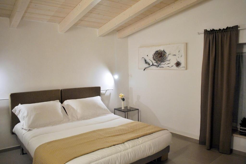 Postel nebo postele na pokoji v ubytování L'Affaccio
