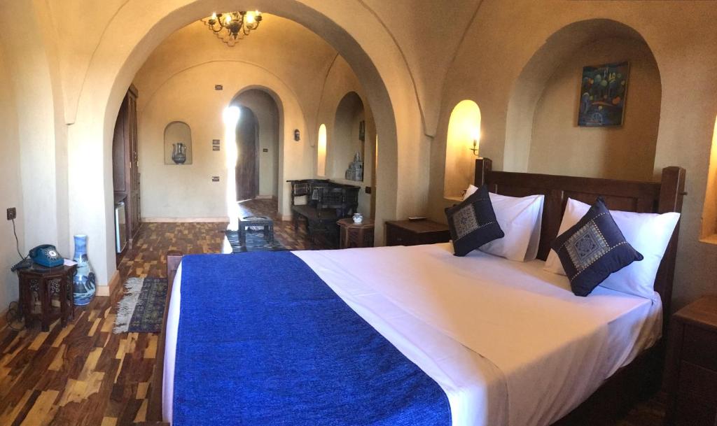 Postel nebo postele na pokoji v ubytování Djorff Palace