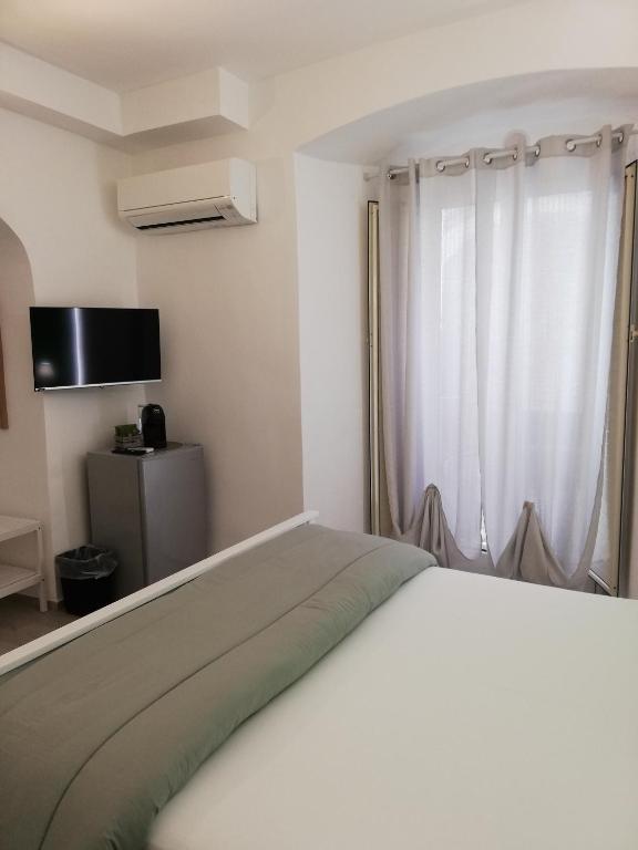 TV a/nebo společenská místnost v ubytování DG Sicily