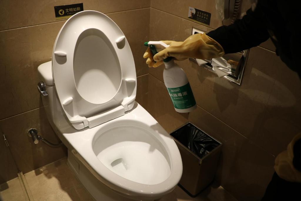 Koupelna v ubytování Rongjiang Hotel