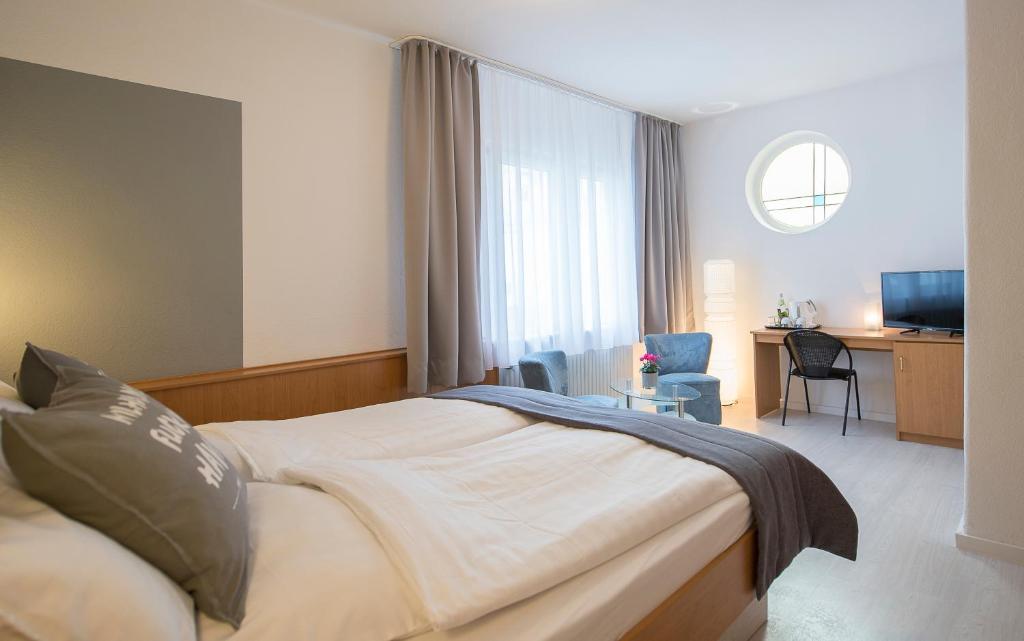 Postel nebo postele na pokoji v ubytování Hotel Keil